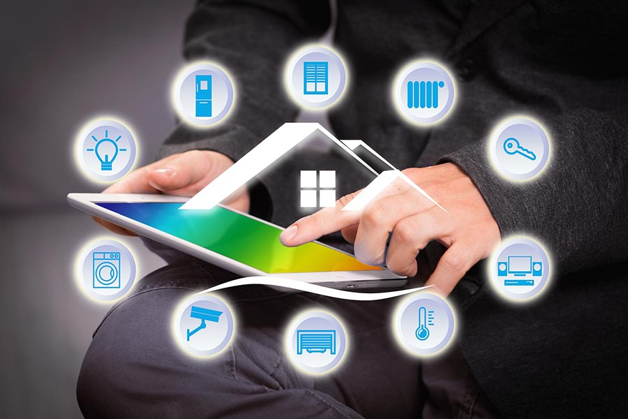 Person using a smart phone to control home devices