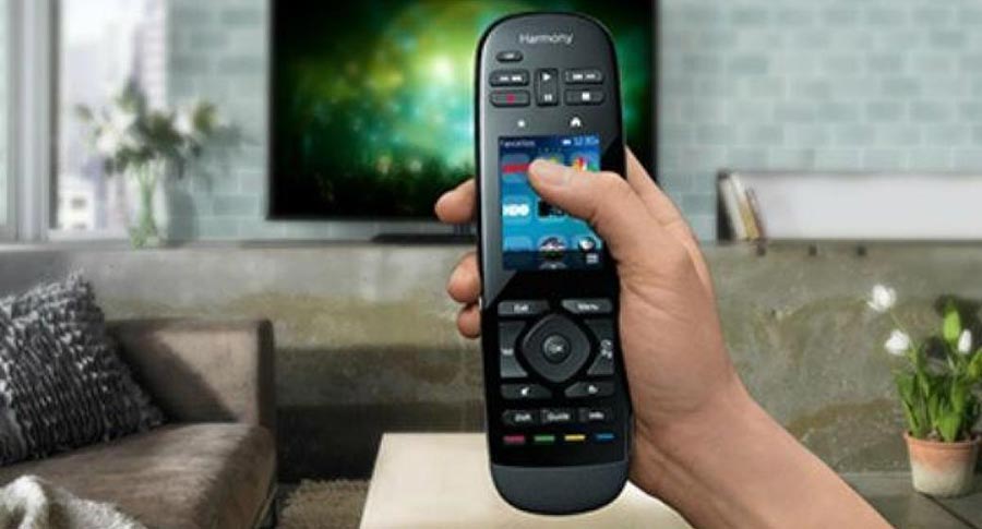 Person holding a unified remote control